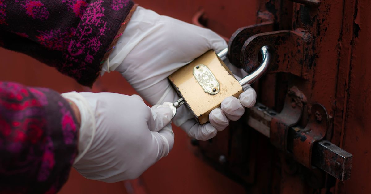 locksmith unlocking front door — Frank Locksmith